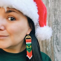 Image 2 of Christmas Criminal Earrings | Mean Green Santa Earrings