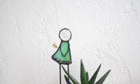 Image 2 of Girl with flower. Figurine for a flower pot