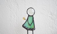 Image 3 of Girl with flower. Figurine for a flower pot