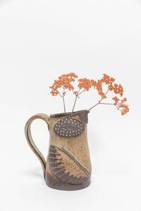 Image 1 of Large Almond Dotted Eye Family Size Pitcher