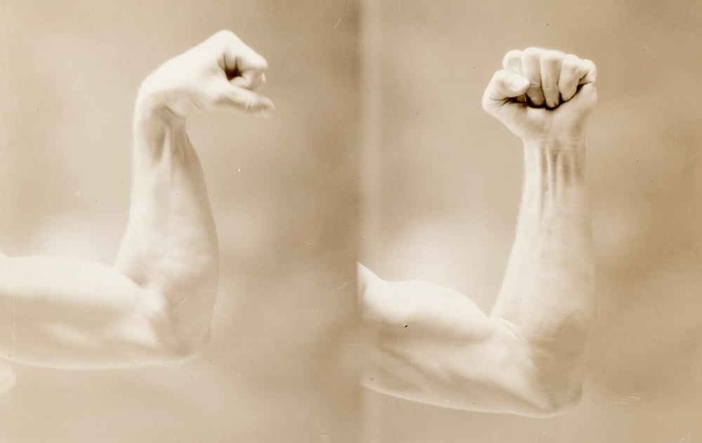 Image of Anonyme: Robert Jones showing his biceps, ca. 1927