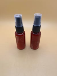 Image 2 of U'Nique Essential Body Oil