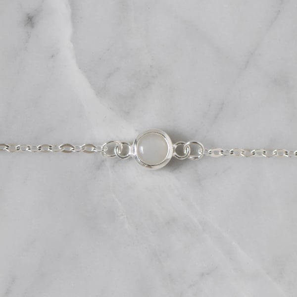 Image of White Moonstone cabochon cut x silver chain bracelet