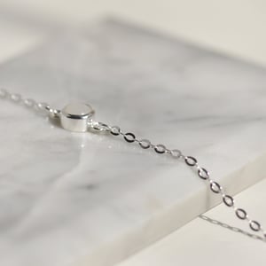 Image of White Moonstone cabochon cut x silver chain bracelet