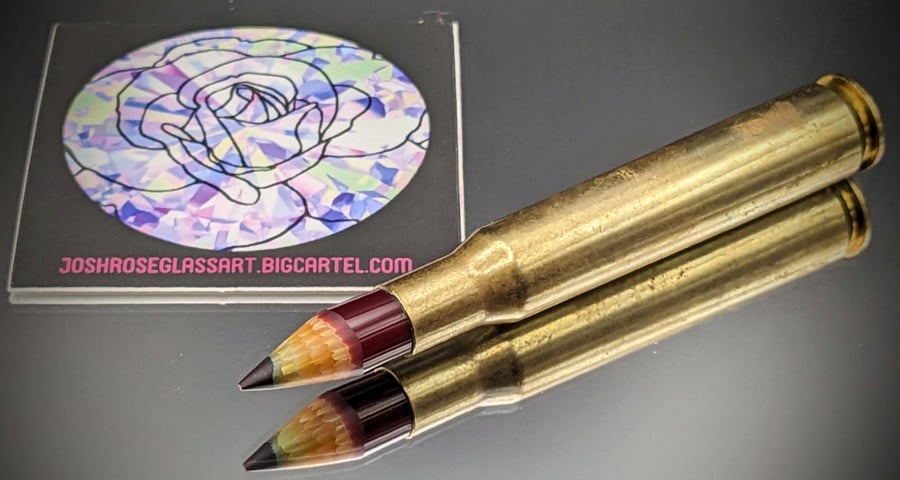 Image of "words as weapons" decorative glass pencils