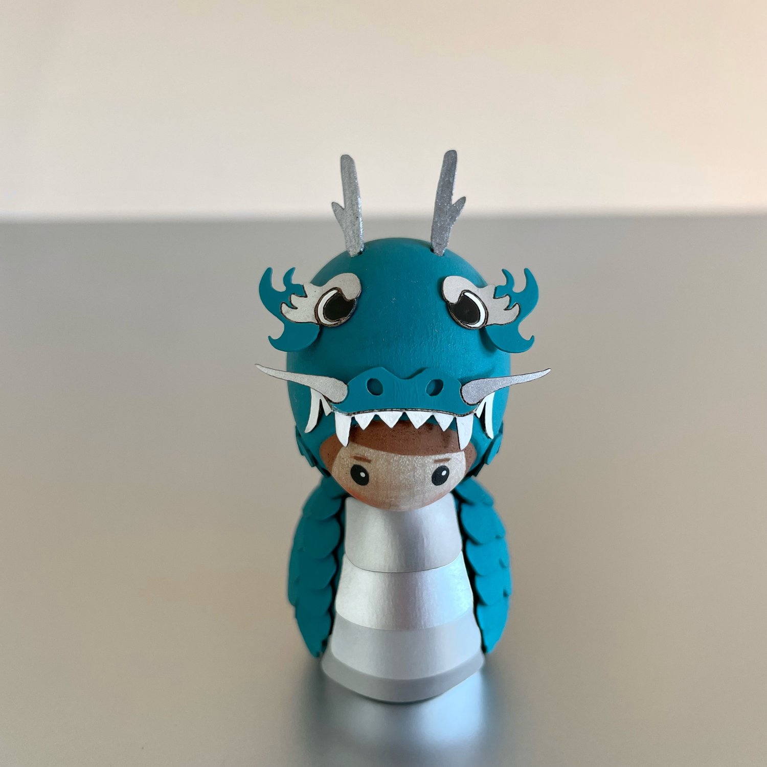 Image of A SURPRISE LISTING - A TEAL/SILVER DORIMU DRAGON