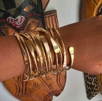 Gold adjustable bangles (6 pcs)