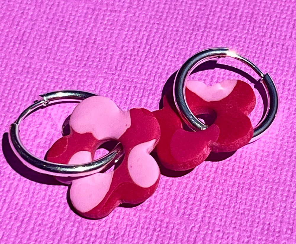 Image of Pink Cowprint Flower Hoops