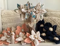 Image 1 of Memory Flowers custom created from a clients loved ones beautiful collection of garments
