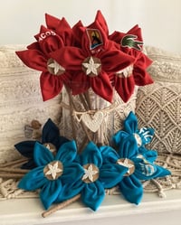 Image 1 of Memory Flowers custom created from a clients loved ones collection of sports polos