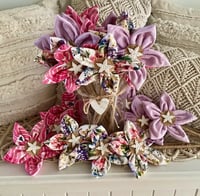 Image 1 of Memory Flowers custom created from a collection of clients loved ones beautiful clothing