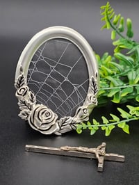 Image 1 of Small oval floral detail Silver framed preserved web