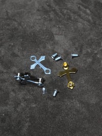 Image 3 of Cross Rivets