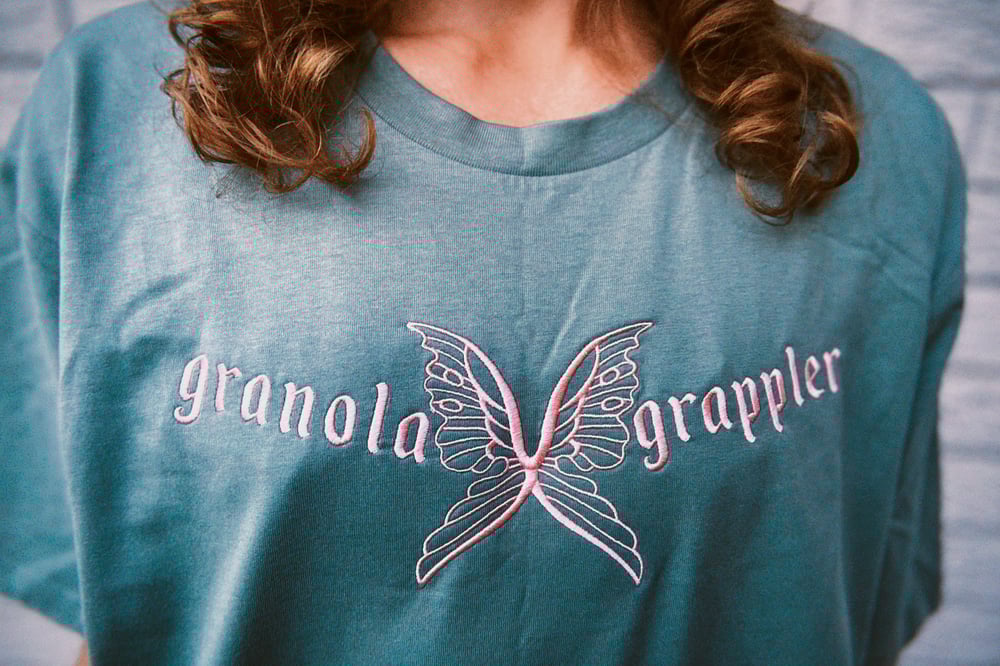 Image of granola grappler embroidered shirt