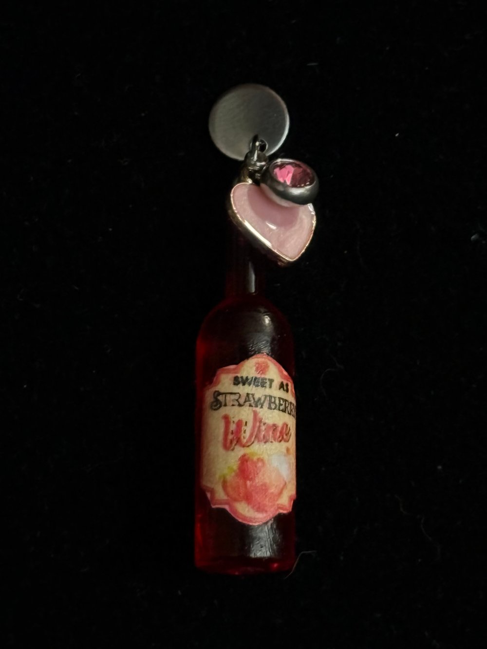 Image of Wine bottles mermaid tears, strawberry wine 
