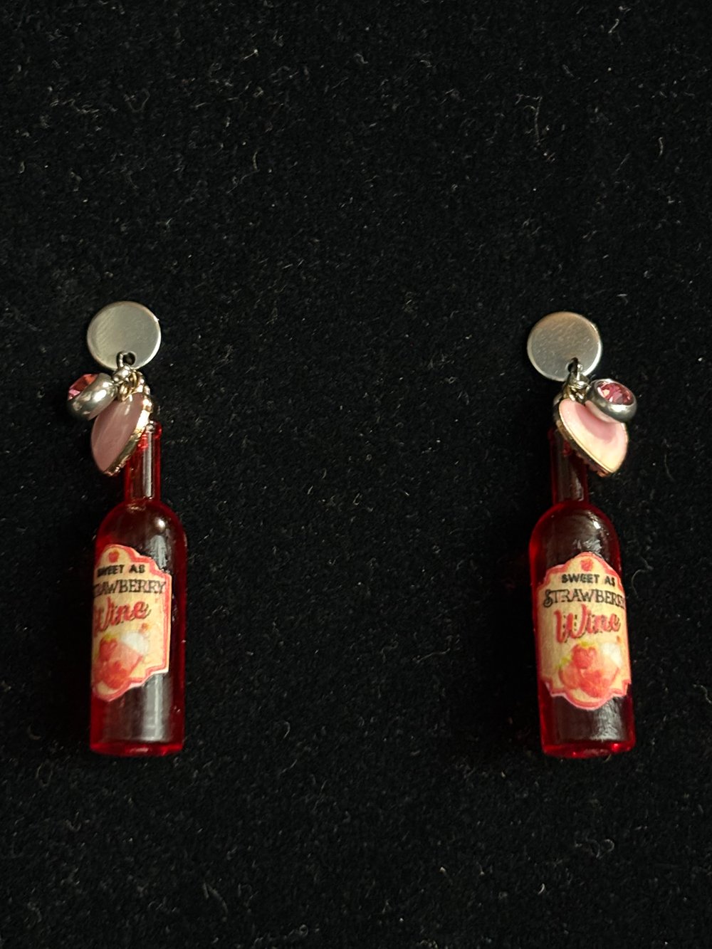 Image of Wine bottles mermaid tears, strawberry wine 