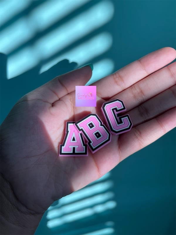 Image of pink croc letters 💕.