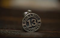 Image 1 of BLACK AND WHITE 13 SUPPORTER PENDANT