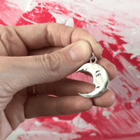 Image 1 of Sterling Silver Crescent Sleepy Moon Pendant
