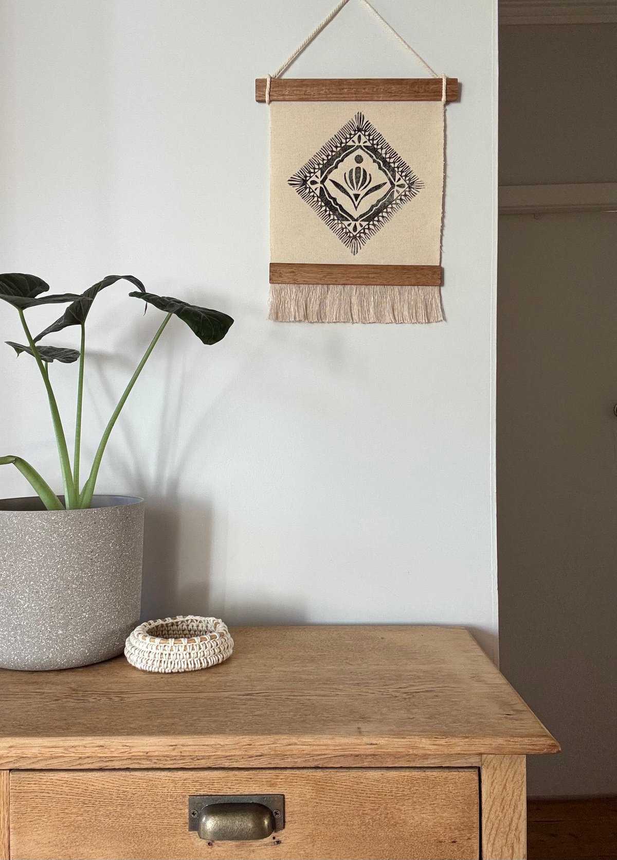 black tapestry hanging