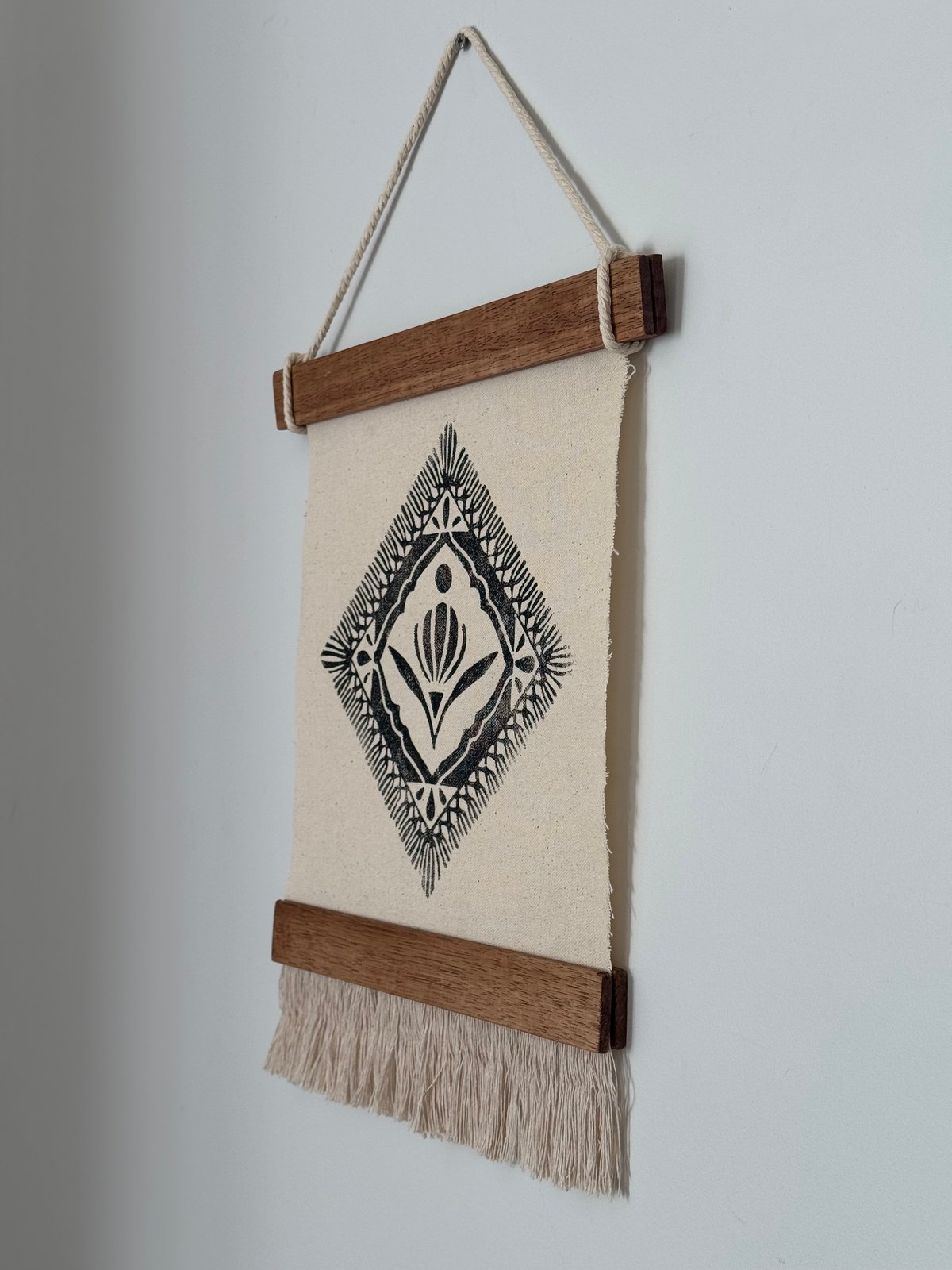 black tapestry hanging