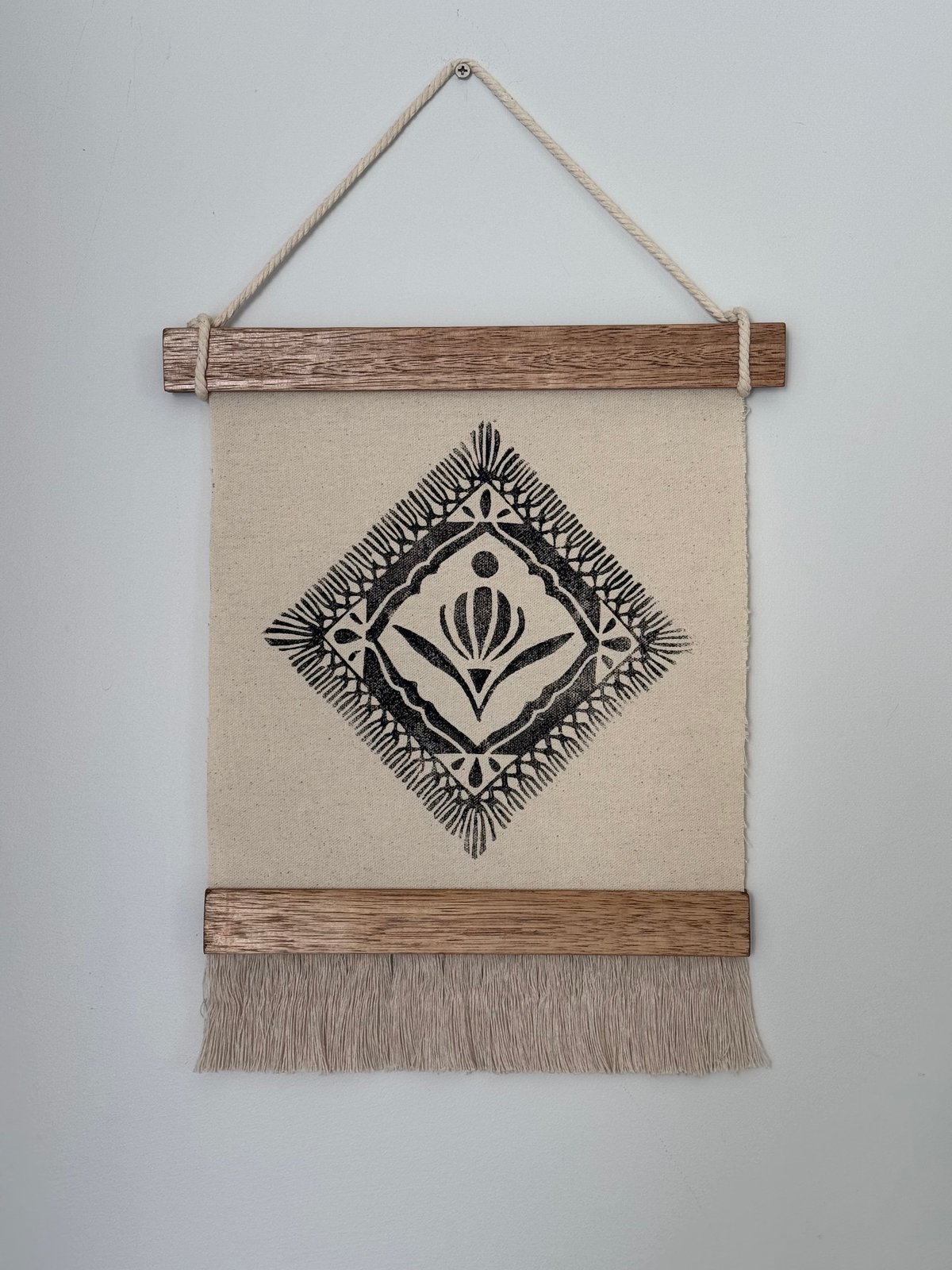 black tapestry hanging