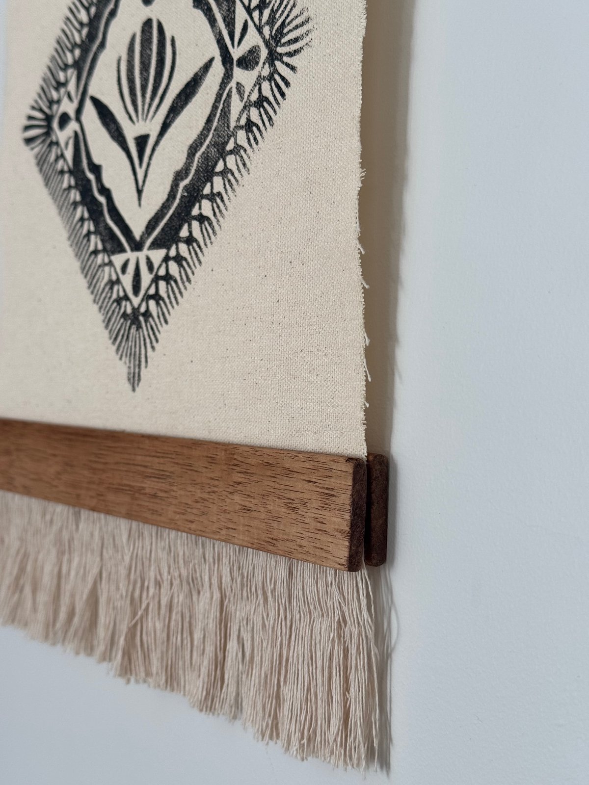 black tapestry hanging