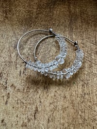 Image 12 of Quartz Crystal rondelles  hoops . n175