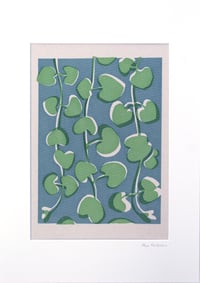 String of Hearts green on chalky blue