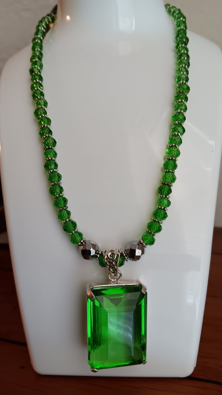 Image of 101.90 CARAT GREEN TOPAZ PENDANT SET IN STERLING SILVER AND TIBETAN SILVER SPACER BEADS