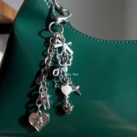 Image 1 of 8 Ball Keychain with Cherub Angel, Hearts, Stars, Bow Charms