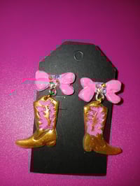Cowgirl boots with bow stud earrings 