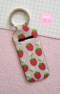 Image 1 of Kawaii Strawberries and Flowers Lipbalm/Lipstick Holder Keychain