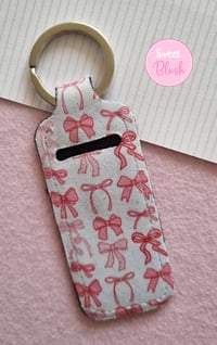 Image 1 of Coquette Bows Lipbalm Holder Keychain