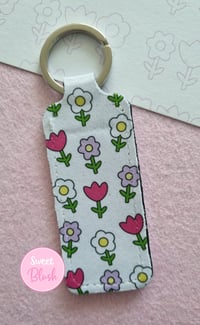 Image 2 of Kawaii Flowers Lipbalm Holder Keychain