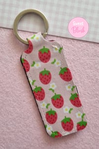 Image 2 of Kawaii Strawberries and Flowers Lipbalm/Lipstick Holder Keychain