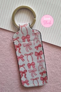 Image 2 of Coquette Bows Lipbalm Holder Keychain