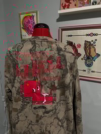 Image 1 of 1 of 1 Somebody Loves Me Reclaimed Camo Long Sleeve