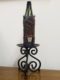 Image 1 of Bronzino's Fatal Fire Whispers - potion bottle