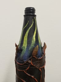 Image 3 of Bronzino's Fatal Fire Whispers - potion bottle