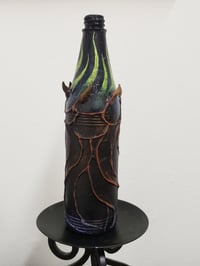 Image 4 of Bronzino's Fatal Fire Whispers - potion bottle