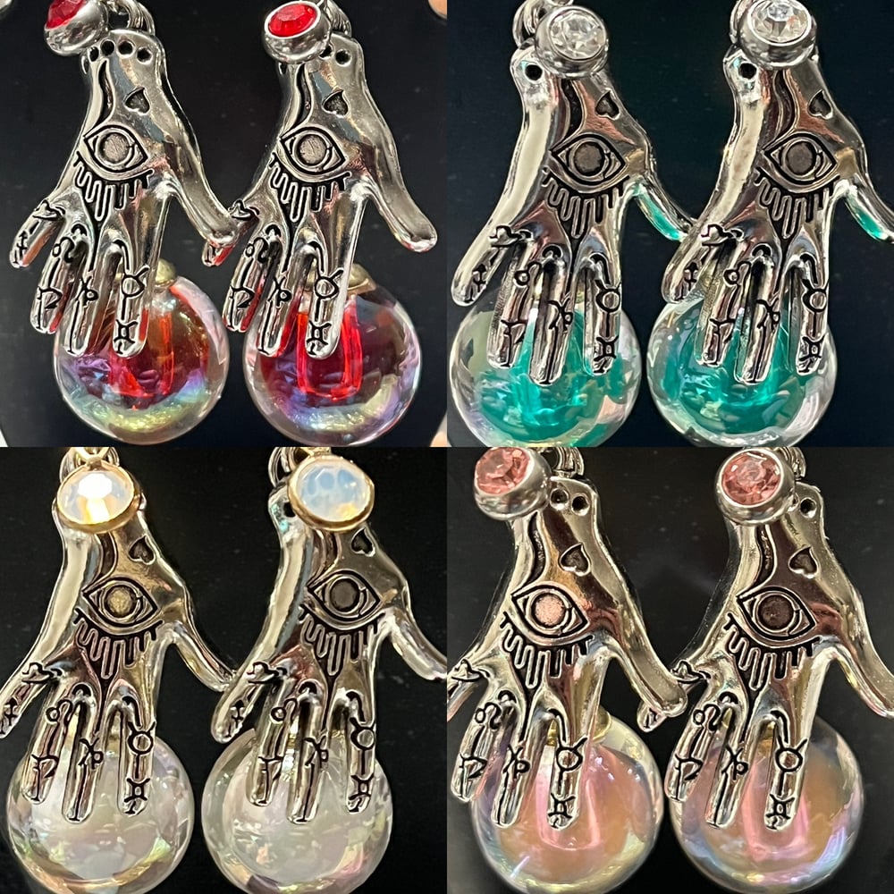 Image of Gypsy hand with crystal ball locking clasp earrings 