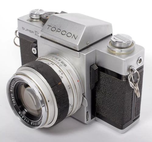 Image of Topcon Super D 35mm SLR with 58mm f1.8 + 135mm F3.5 lenses #5538