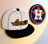 tufted astros wall hangings