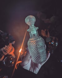 Studded potion bottle