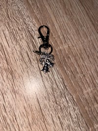 Silver bells charm