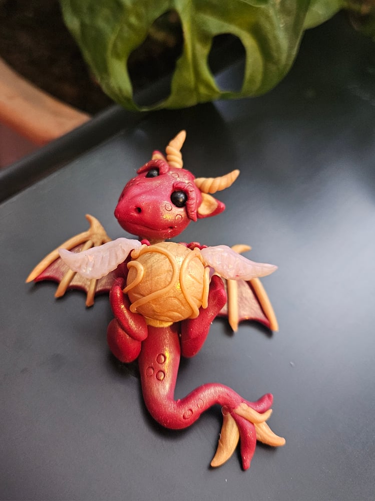 Image of Gryffindor themed dragon