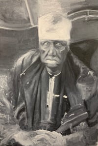 portrait of old man in a bar in paris