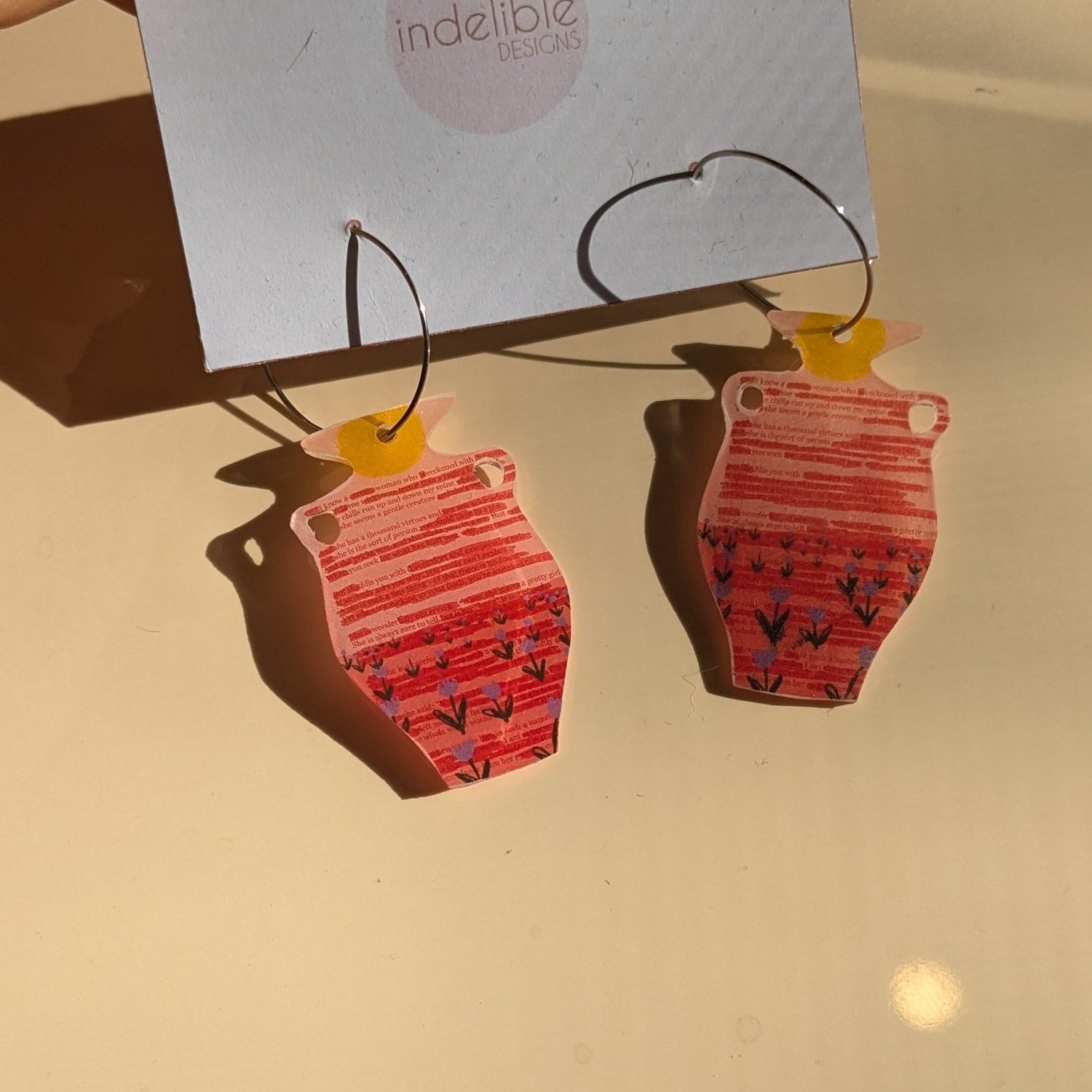 Image of “she” poetry earrings