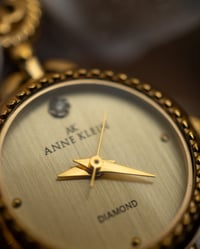 Image 4 of Gold Anne Klein floral watch